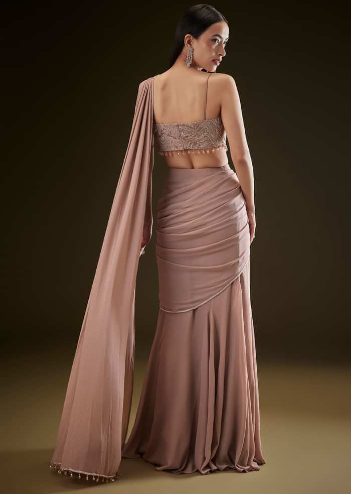 Dusty Pink Fishcut Drape Saree With Embellished Corset Blouse