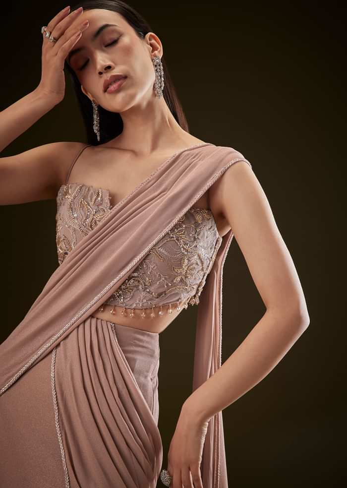 Dusty Pink Fishcut Drape Saree With Embellished Corset Blouse