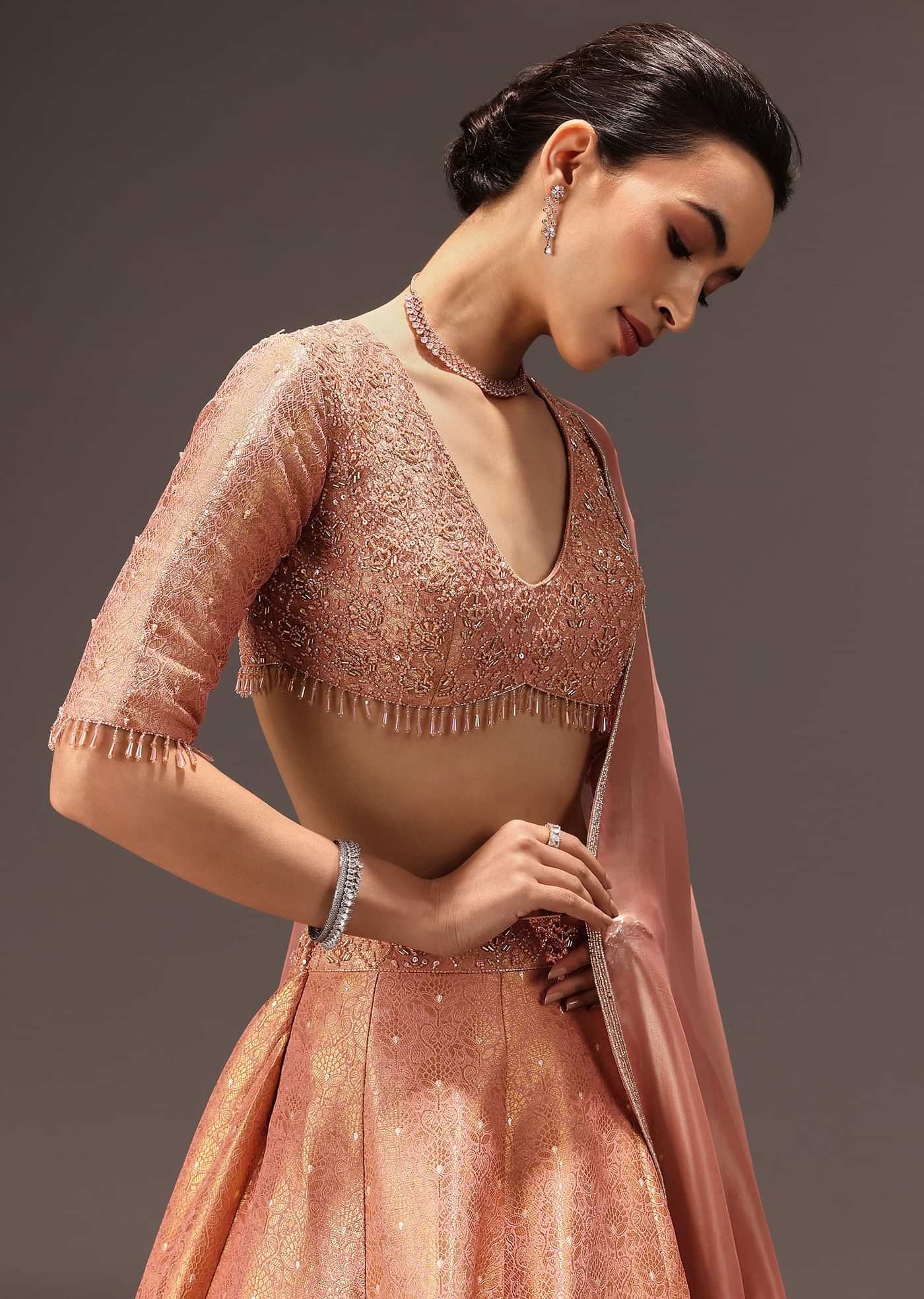 Dusty Peach Banarasi Silk Hand Work Lehenga Set