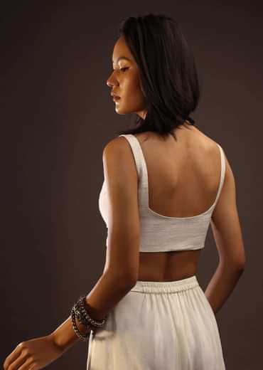 Egret White Sleeveless Blouse With A Sweetheart Neckline. Padded With A Back Hook Closure