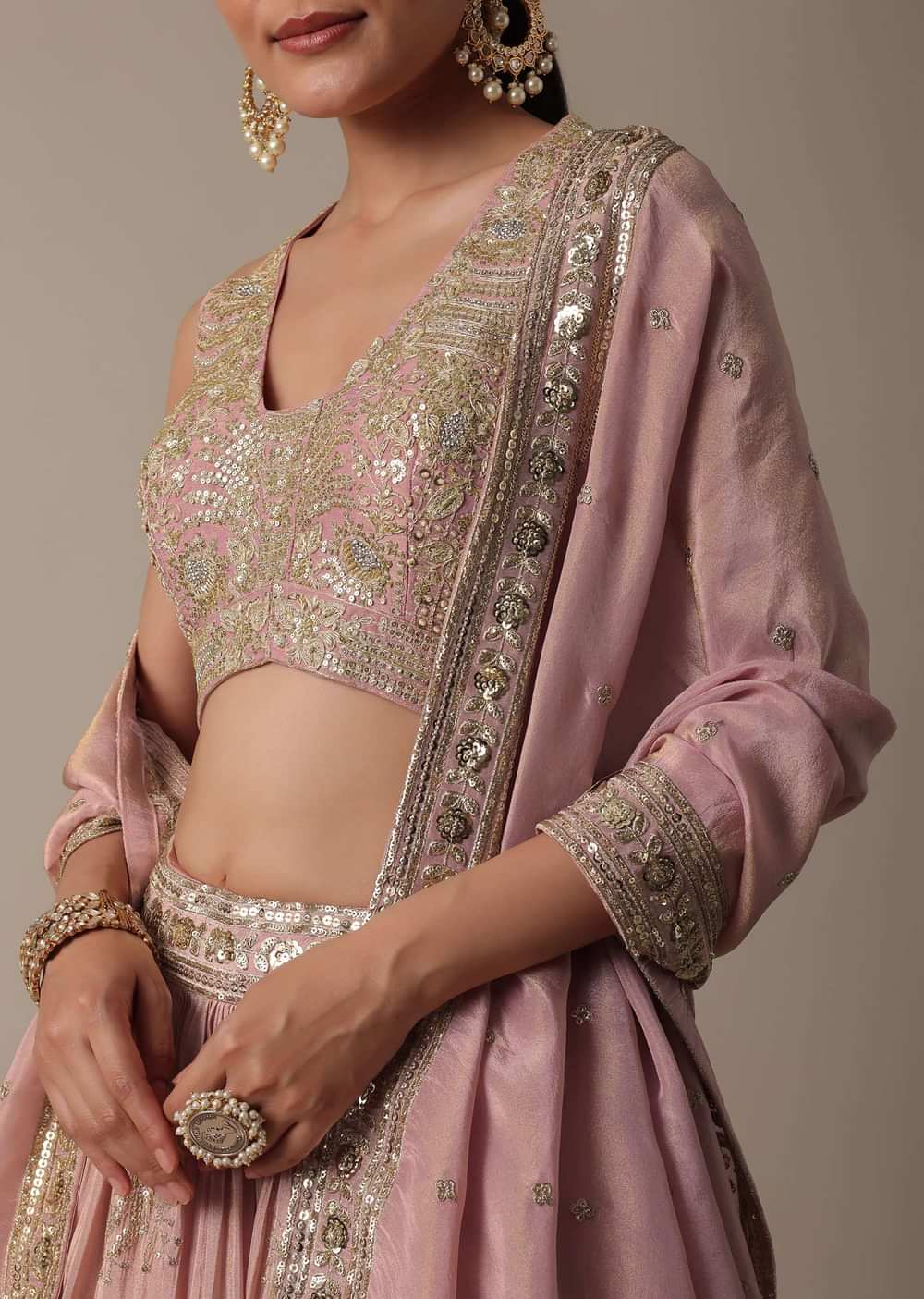 Elegant Pink Lehenga Choli Set With Intricate Embroidery