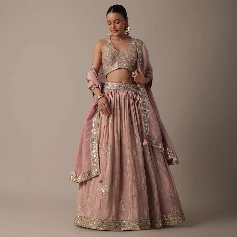 Elegant Pink Lehenga Choli Set With Intricate Embroidery