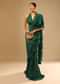 Emerald Green Ready Pleated Ruffle Saree With A Halter Neck Blouse And 3D Embroidered Belt