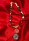 Emerald green stone and pearl beaded necklace with a peach rose pendant only on Kalki