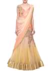 Peachy cream shaded lehenga sari embellished in zardosi only on Kalki