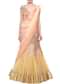 Peachy cream shaded lehenga sari embellished in zardosi only on Kalki