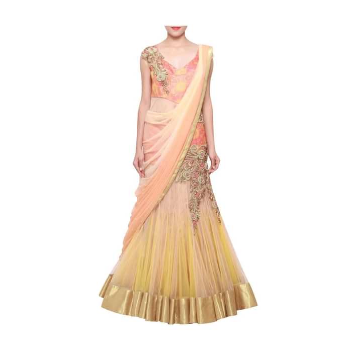 Peachy cream shaded lehenga sari embellished in zardosi only on Kalki