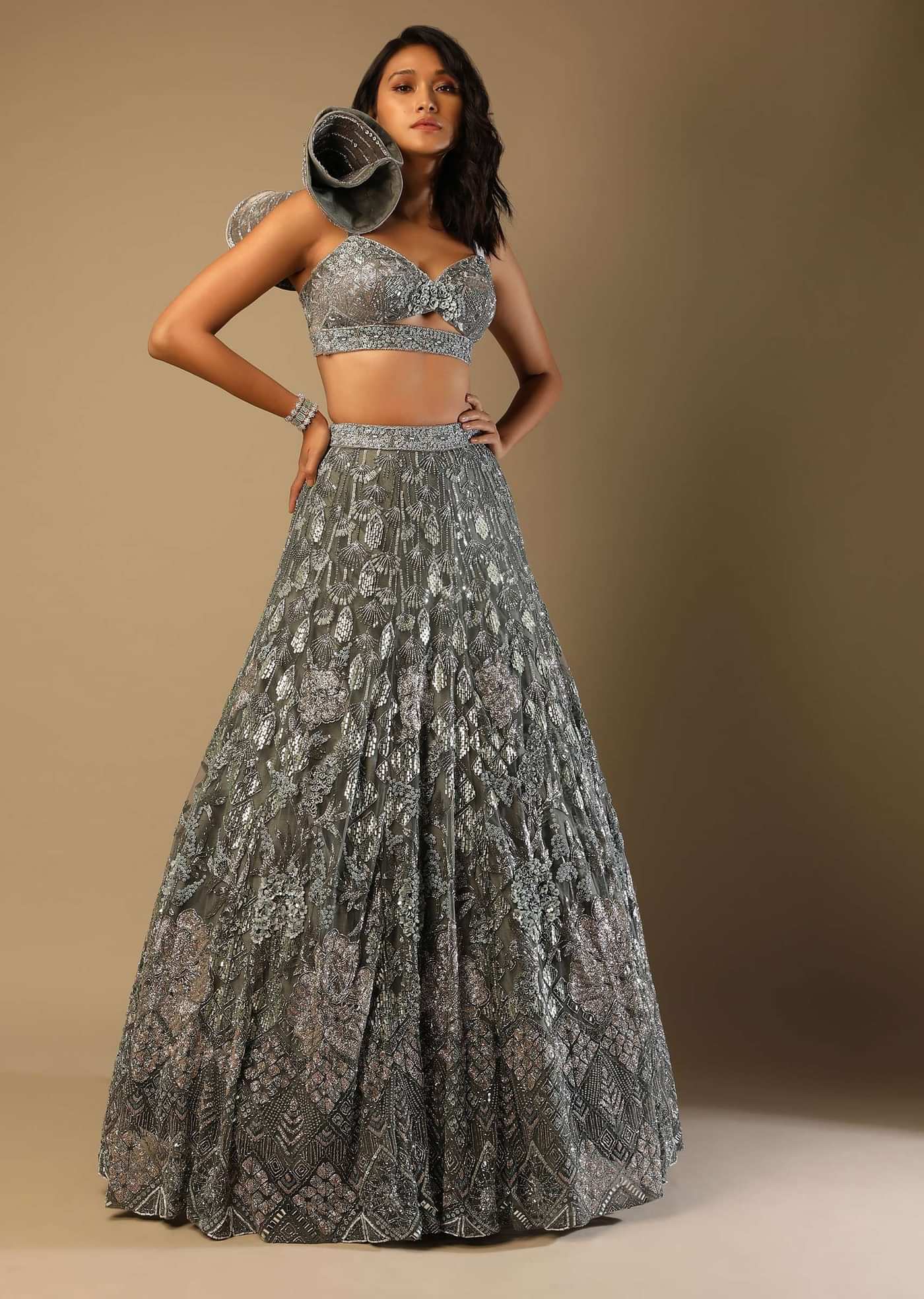 Fern Green Lehenga Choli In Net With Stone Hand Embroidered Floral Motifs And Fancy Origami Cones On The Shoulder