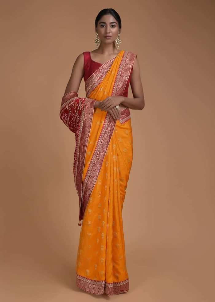 Fire Yellow Saree With Weaved Floral Buttis And Bandhani Printed Pallu Online - Kalki Fashion