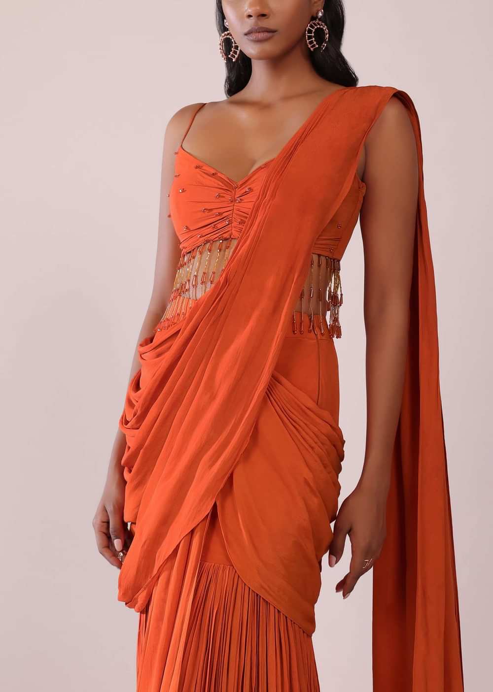 Orange Crepe Drape Saree And Blouse With Crystal Tassels All Over