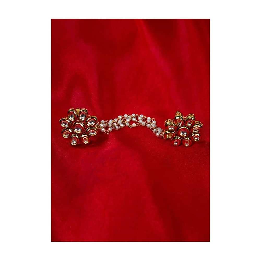 Floral shape polki kundan rings with attached multi layer moti chain only on Kalki
