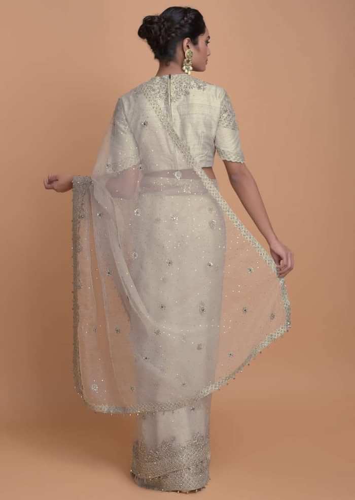 Fog Grey Saree In Organza With Scattered Sequins All Over And Embroidered Buttis Online - Kalki Fashion