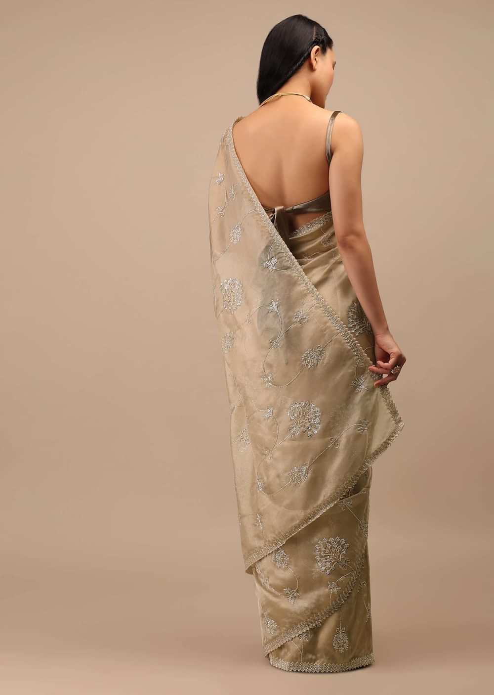 Frosted Almond Tissue Saree In Zardozi Embroidery Buttis, Leafy Motifs Embroidery Detailing On Border