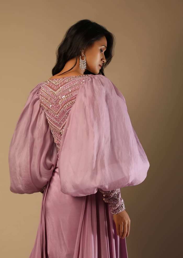 Frozen Mauve Gown With Hand Embroidered Bodice, Balloon Sleeves And A Long Trail