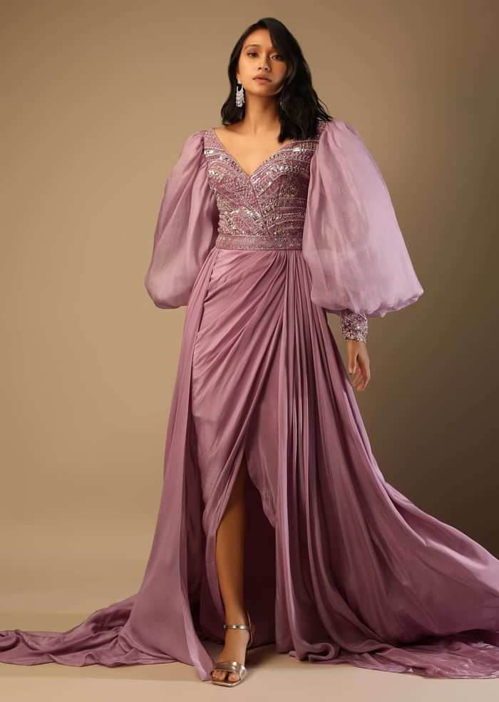 Frozen Mauve Gown With Hand Embroidered Bodice, Balloon Sleeves And A Long Trail