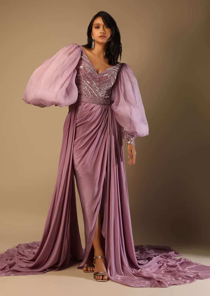 Frozen Mauve Gown With Hand Embroidered Bodice, Balloon Sleeves And A Long Trail