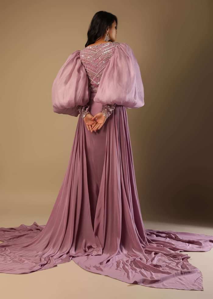 Frozen Mauve Gown With Hand Embroidered Bodice, Balloon Sleeves And A Long Trail