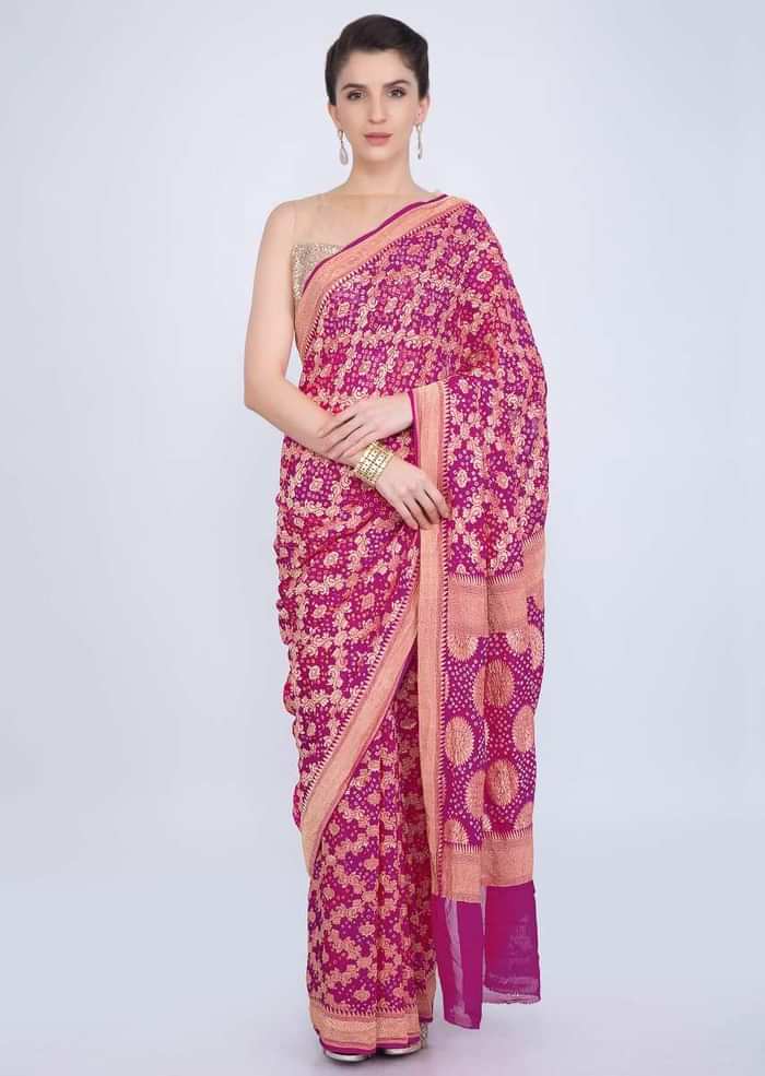Fuchsia pink georgette saree with weaved jaal work  and bandhani print only on kalki