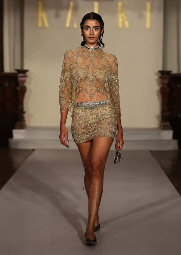 Gold Net Indo Western Jewelled Cape And Skirt Set With Tassels