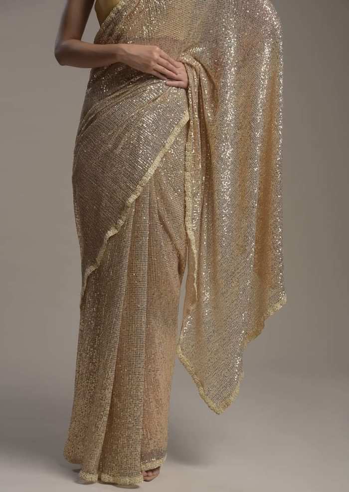 Gold Saree Embellished In Sequins With Moti Embroidered Border And Unstitched Blouse Online - Kalki Fashion