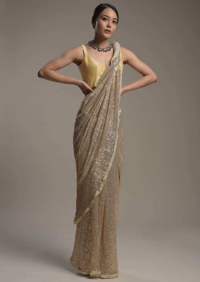 Gold Saree Embellished In Sequins With Moti Embroidered Border And Unstitched Blouse Online - Kalki Fashion
