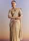 Gold Tissue Saree With Emerald Stone Accents And Heavy Embroidery