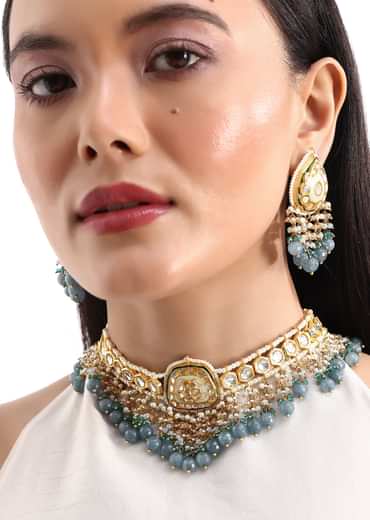 Gold And Blue Kundan Short Necklace Set In Mix Metal