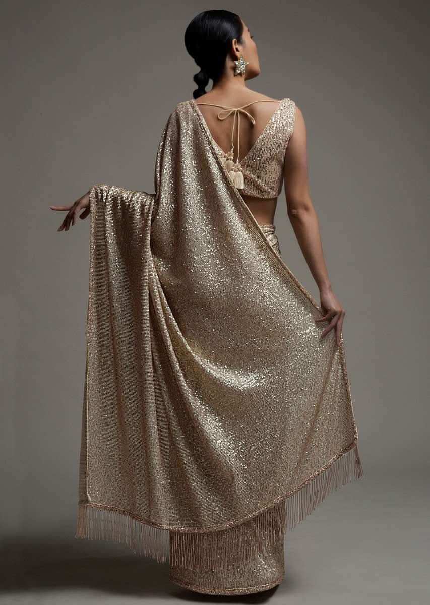 Gold Beige Saree Embellished In Sequins With Fringes On The Pallu And Unstitched Blouse