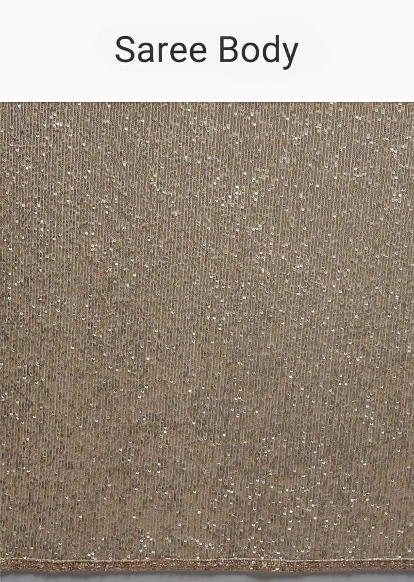 Gold Beige Saree Embellished In Sequins With Fringes On The Pallu And Unstitched Blouse