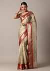Gold Chanderi Kota Silk Woven Saree With Mirror Work And Unstitched Blouse Piece