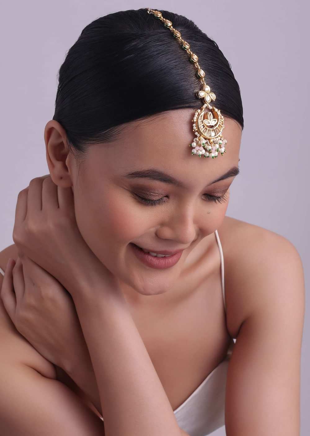 Gold Finish Kundan Mangtikka With Dangling Pearls