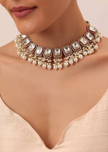 Gold Finish Kundan Necklace Set With Pearl Drops And Geometric Motifs