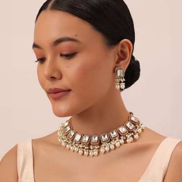 Gold Finish Kundan Necklace Set With Pearl Drops And Geometric Motifs