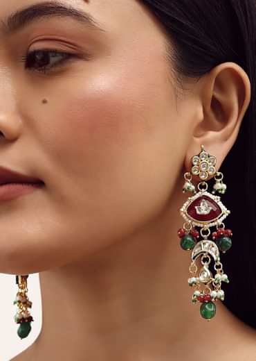 Gold Finish Kundan Necklace Set With Ruby And Emerald In Mix Metal