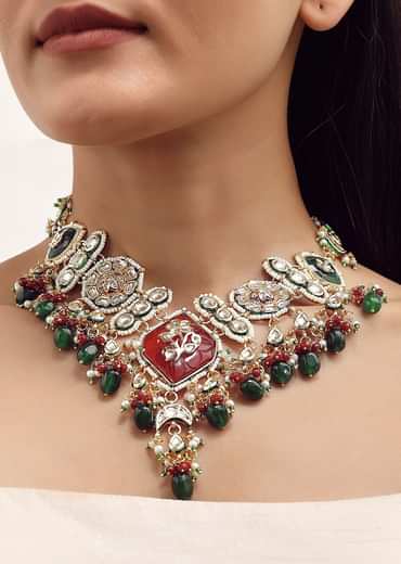 Gold Finish Kundan Necklace Set With Ruby And Emerald In Mix Metal
