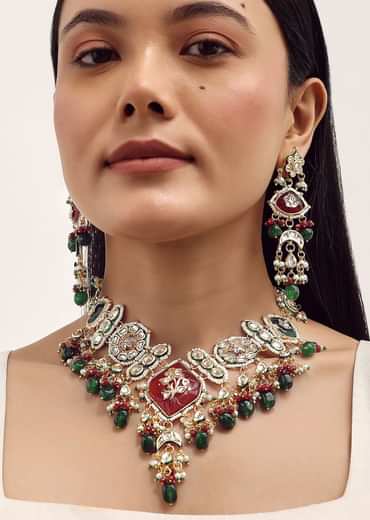 Gold Finish Kundan Necklace Set With Ruby And Emerald In Mix Metal