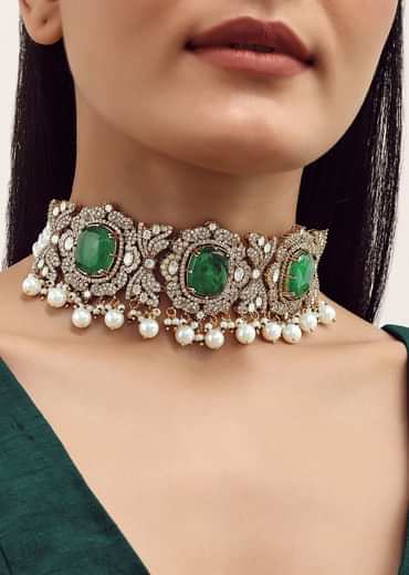 Gold Finish Necklace Set With Emerald Stone In Mix Metal
