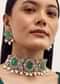 Gold Finish Necklace Set With Emerald Stone In Mix Metal