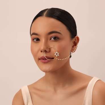 Gold Finish Nose Ring With Floral Motif And Studded Kundan