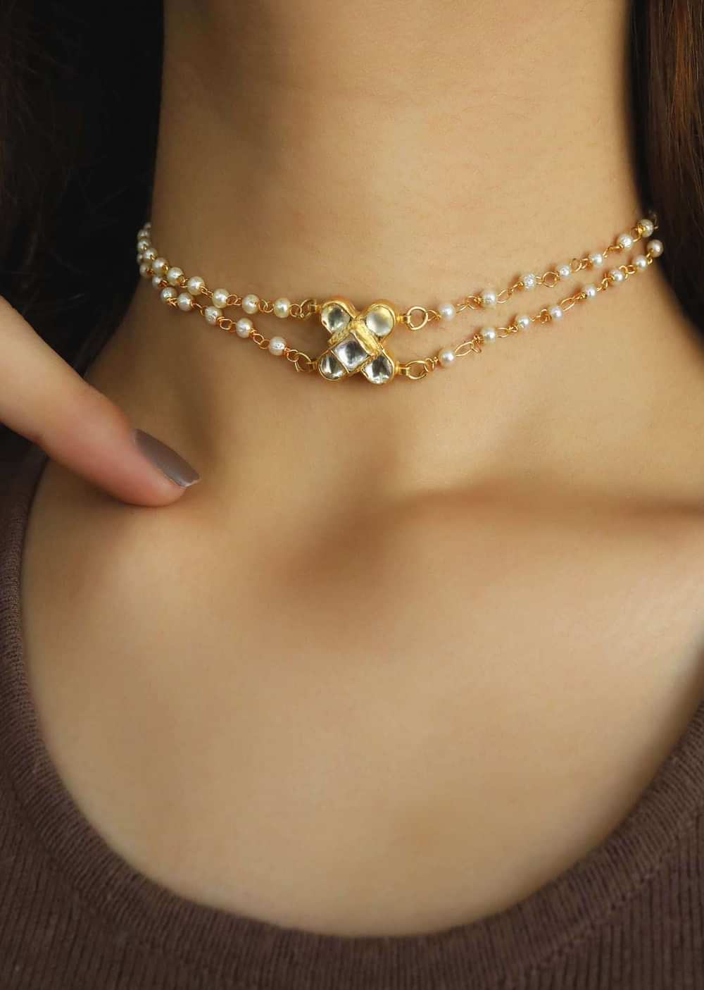 Gold Necklace In A Floral Design Encrusted With Kundan And Two Pearl Strings