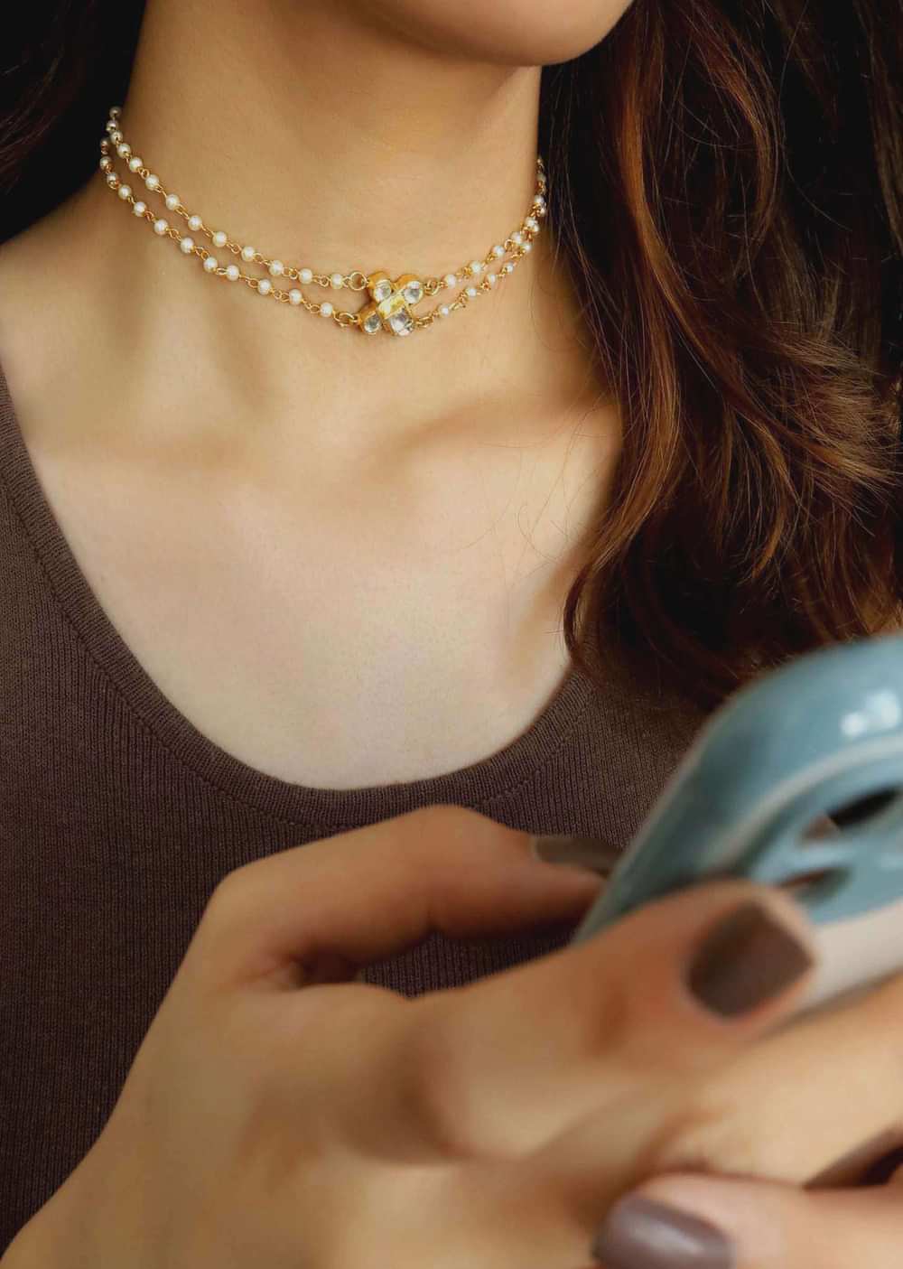 Gold Necklace In A Floral Design Encrusted With Kundan And Two Pearl Strings