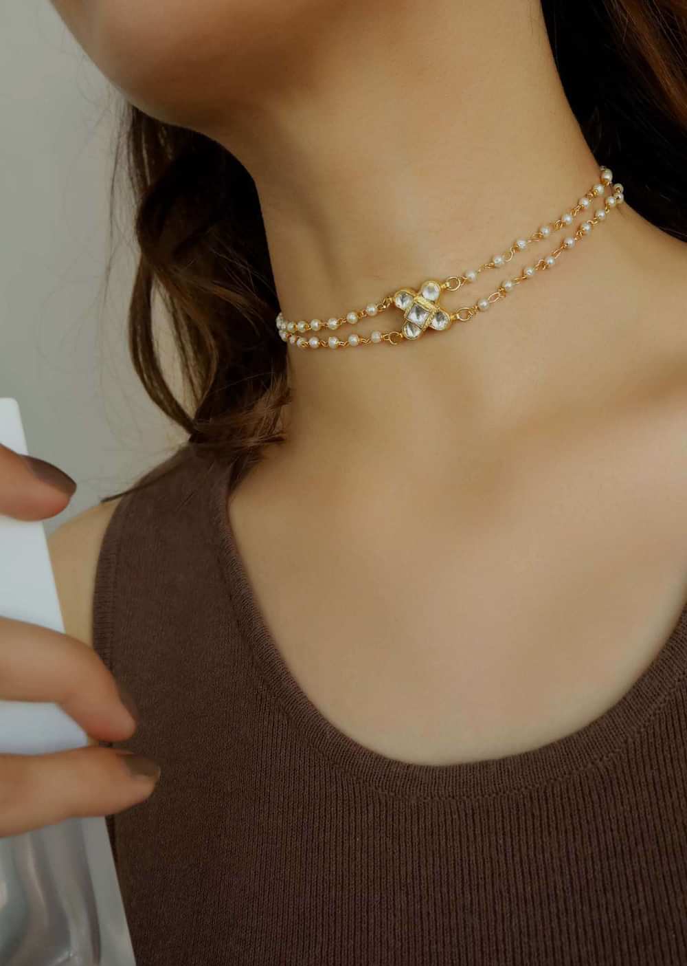 Gold Necklace In A Floral Design Encrusted With Kundan And Two Pearl Strings