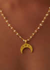 Gold Necklace With Crescent Pendant And Pearl Chain