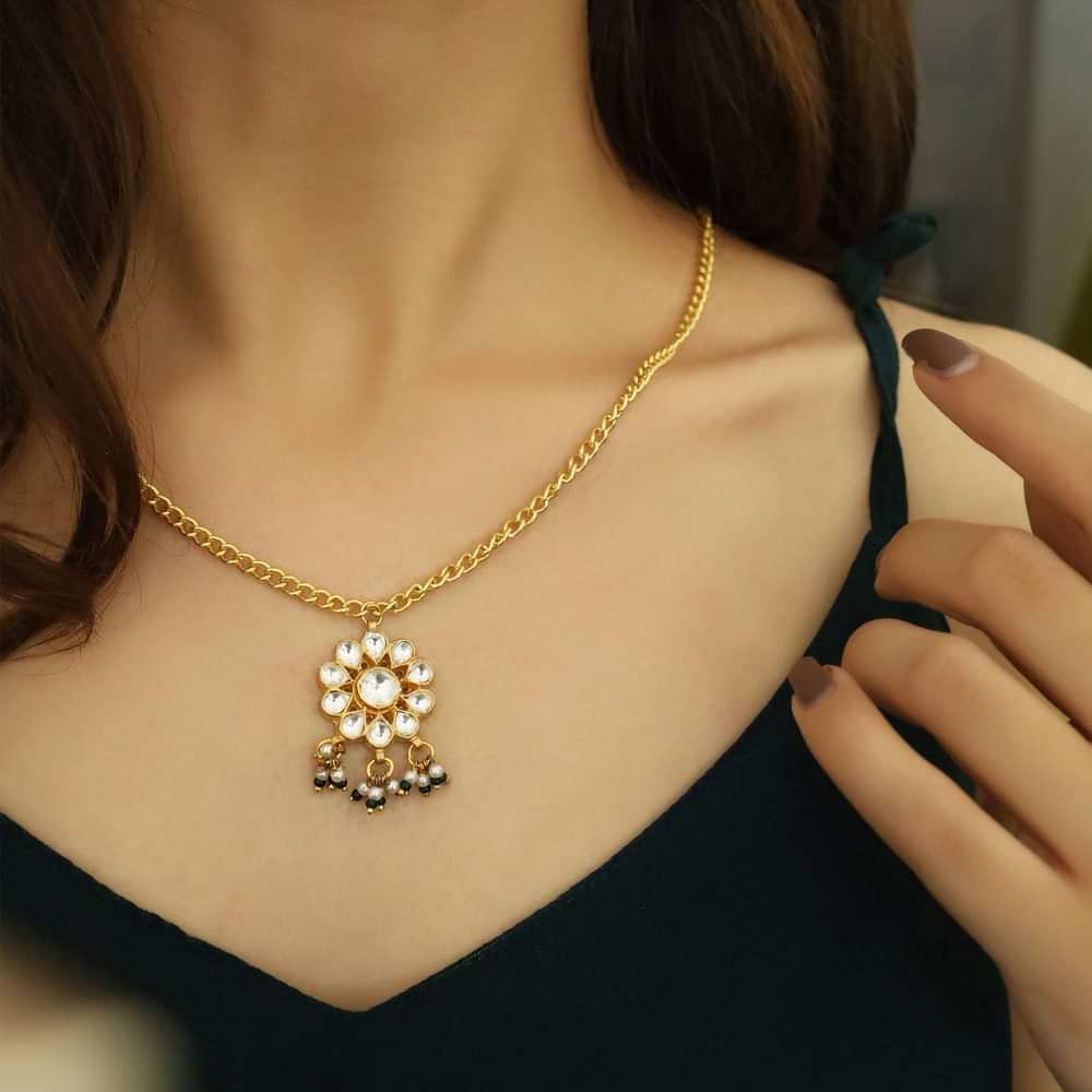 Gold Necklace With Floral Kundan Pendant Accented With Shell Pearls And Green Stones