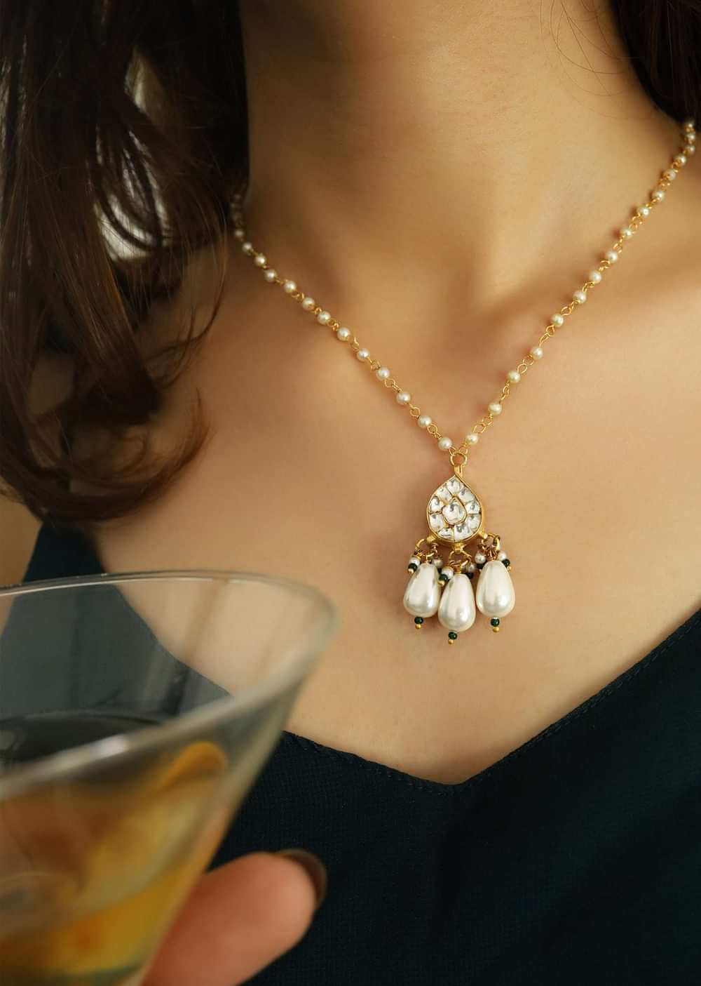 Gold Necklace With Kundan Pendant And Accented With Green Stones And Pearls