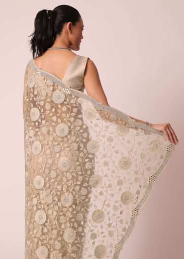 Gold Net Saree With Stone Studded And Florar work And Unstitched Blouse Piece