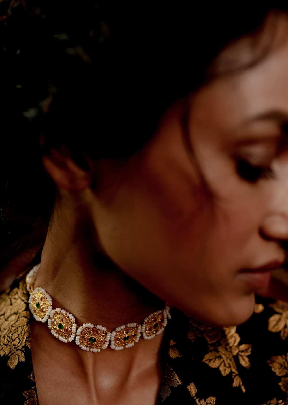 Gold Plated Necklace With Mughal Inspired Motifs Adorned In Pearls And Green Cz By Zariin