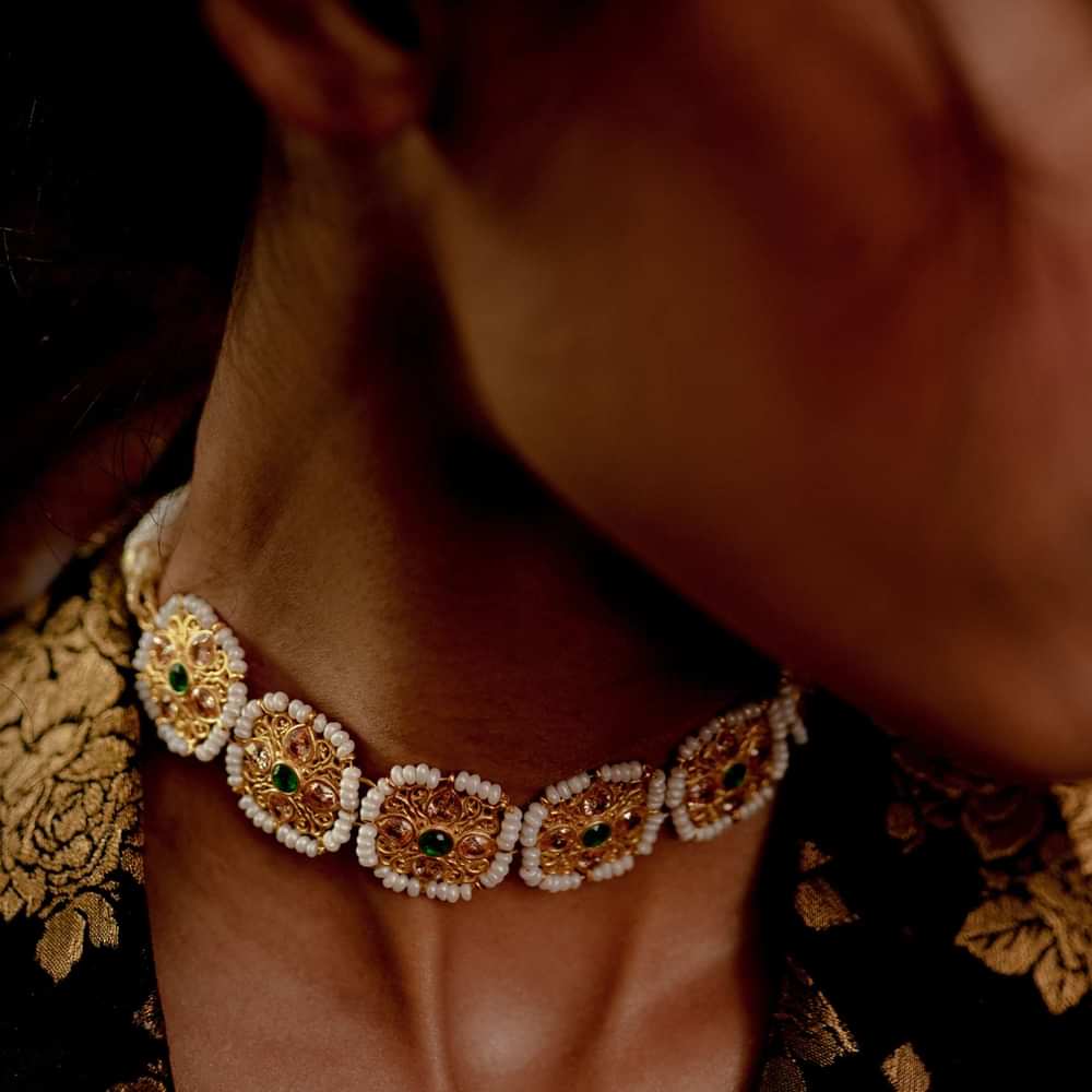 Gold Plated Necklace With Mughal Inspired Motifs Adorned In Pearls And Green Cz By Zariin