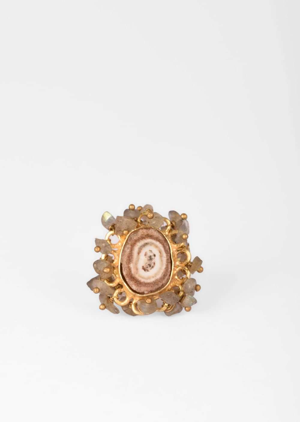 Gold Plated Ring With A Taupe Semi Precious Stone Centre And Tiny Iridescent Stone Pieces All Over