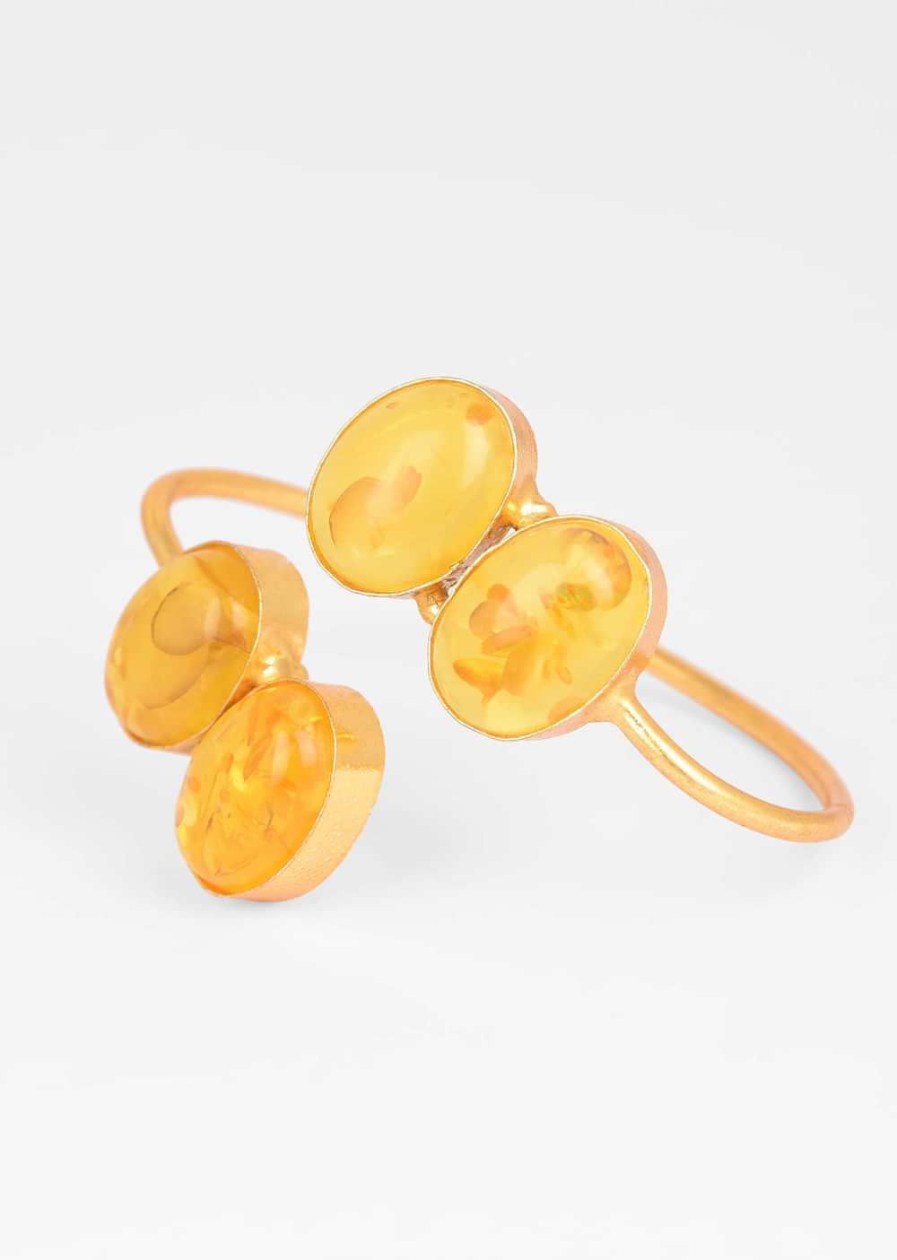 Gold Plated Wrap-Around Bangle With Oval Shaped Yellow Colored Semi Precious Stones